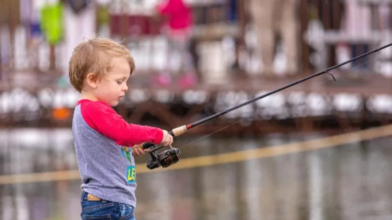 Photo of boy fishing