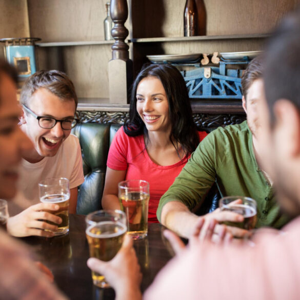 Photo of friends chatting at a pub