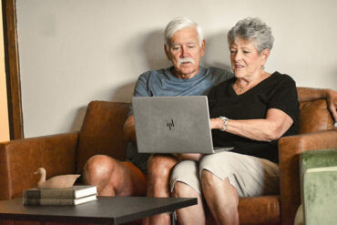 Photo of older adults using computer