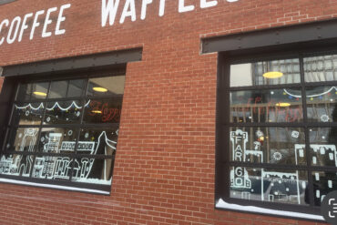 Photo of downtown window decorated for the holidays