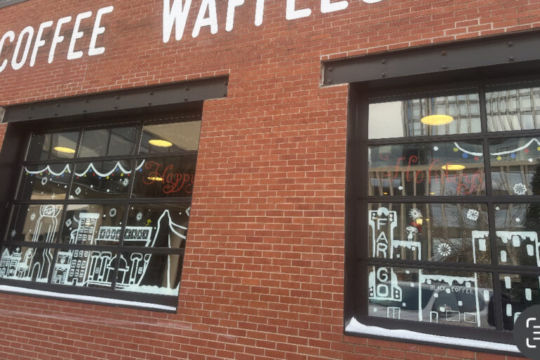 Photo of downtown window decorated for the holidays